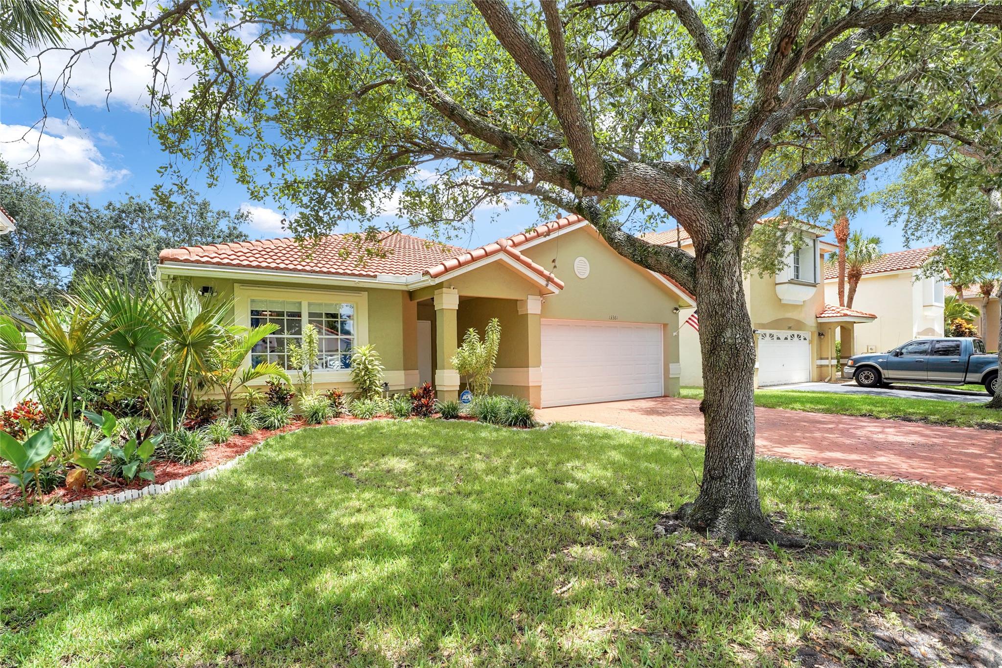 Welcome to Sawgrass Plantation! Step into this beautifully redesigned and spacious one-story home featuring 3 bedrooms and 2.5 baths in a highly desirable community. This tastefully updated residence offers a new roof, vaulted ceilings, and open-concept layout with a modern kitchen featuring quartz countertops and stainless steel appliances. Enjoy new wood laminate flooring throughout, gorgeous master bathroom, and extra-large 3rd bedroom that includes a built-in Murphy bed, perfect for guests, a home office, or multi-use space. Step outside to your fully fenced backyard with a screened-in patio and private jacuzzi, ideal spot to relax or entertain. Move-in-ready home has it all—style, flexibility, & peace of mind. Centrally located near Schools, Shopping Centers, Restaurants and Highways.