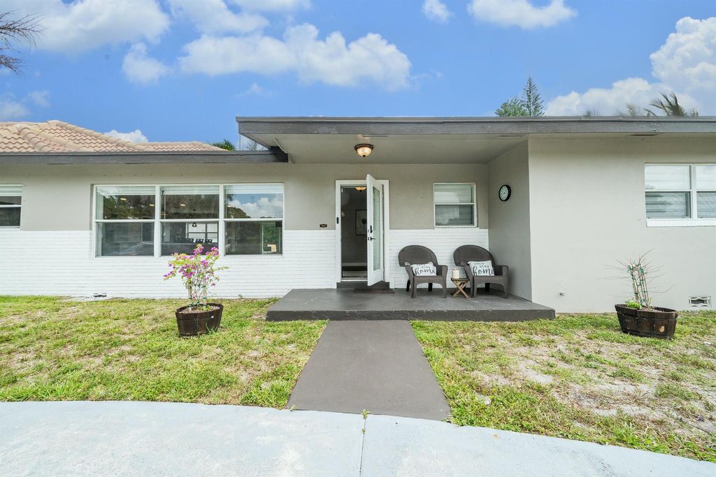 Photo of 1701 Boardman Avenue SW, West Palm Beach, FL 33407 (MLS # R11090134)
