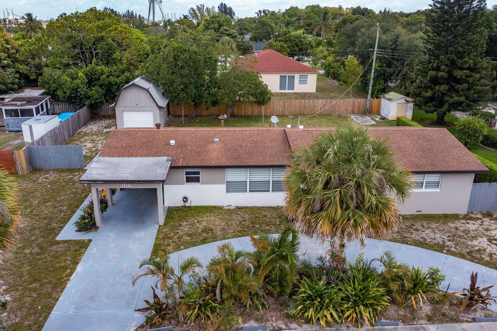 Photo of 1701 Boardman Avenue SW, West Palm Beach, FL 33407 (MLS # R11090134)