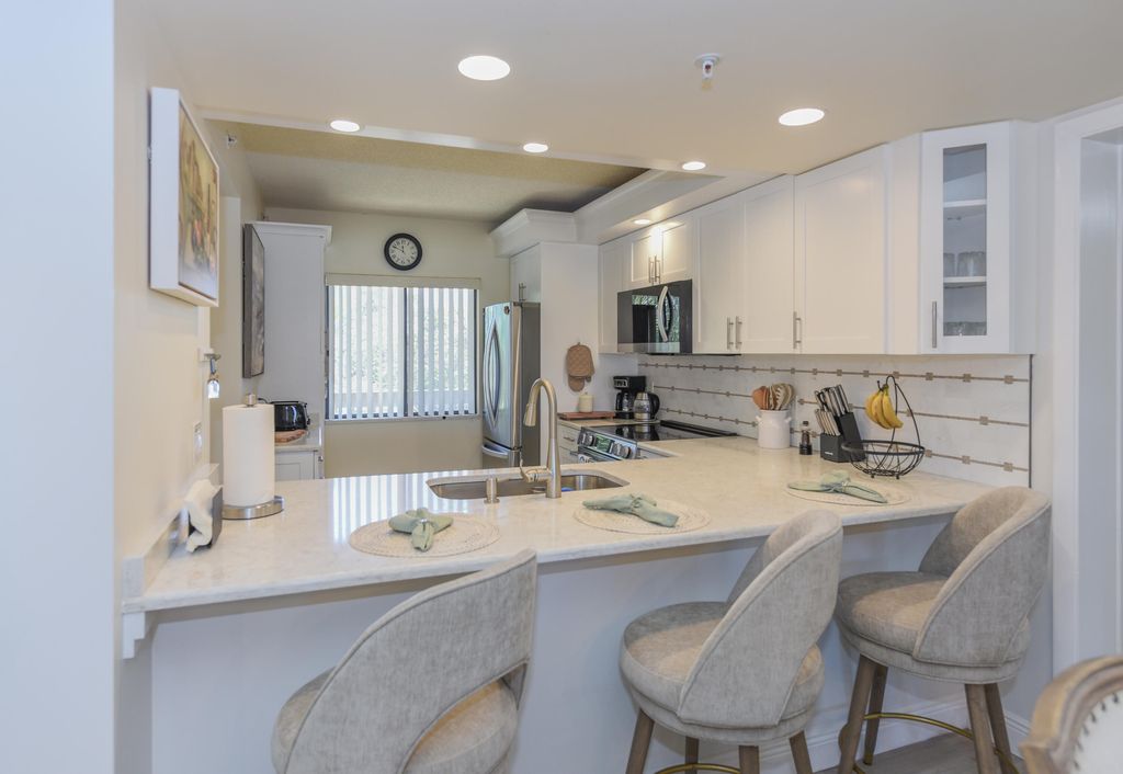 Photo of 901 Seafarer Circle #302, Jupiter, FL 33477 (MLS # B26023975)