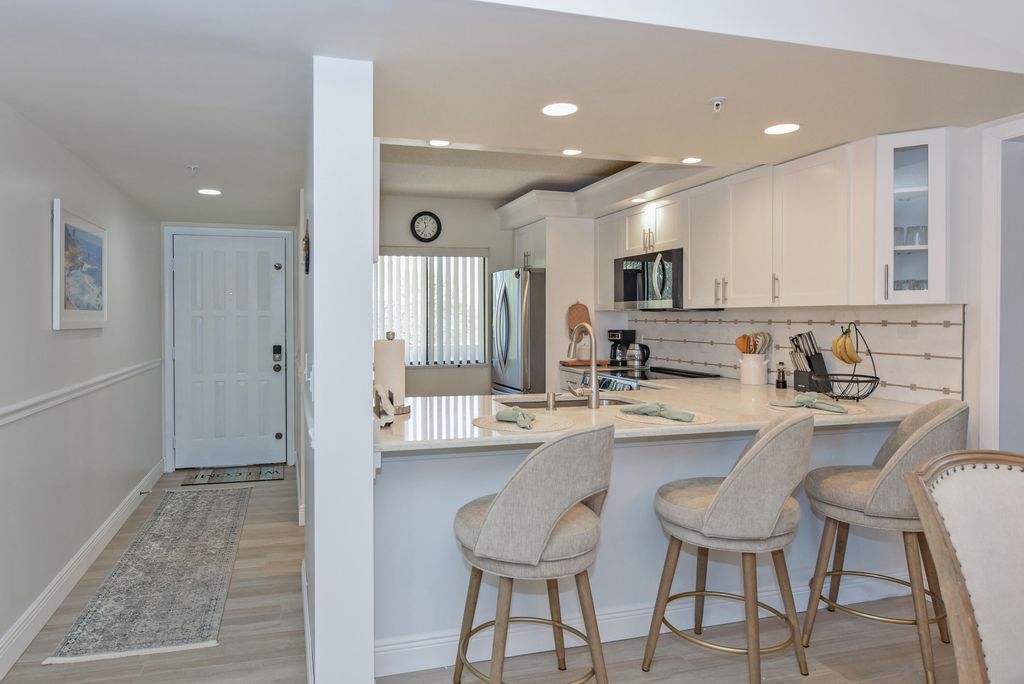 Photo of 901 Seafarer Circle #302, Jupiter, FL 33477 (MLS # B26023975)
