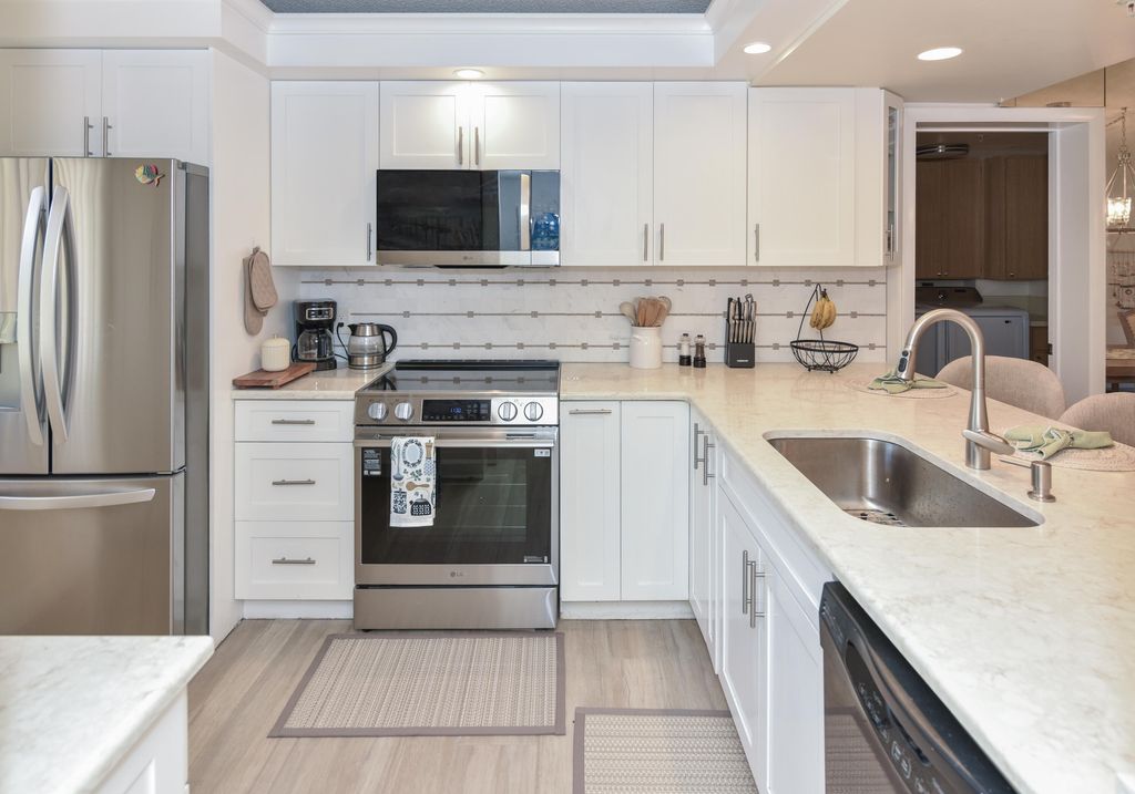 Photo of 901 Seafarer Circle #302, Jupiter, FL 33477 (MLS # B26023975)