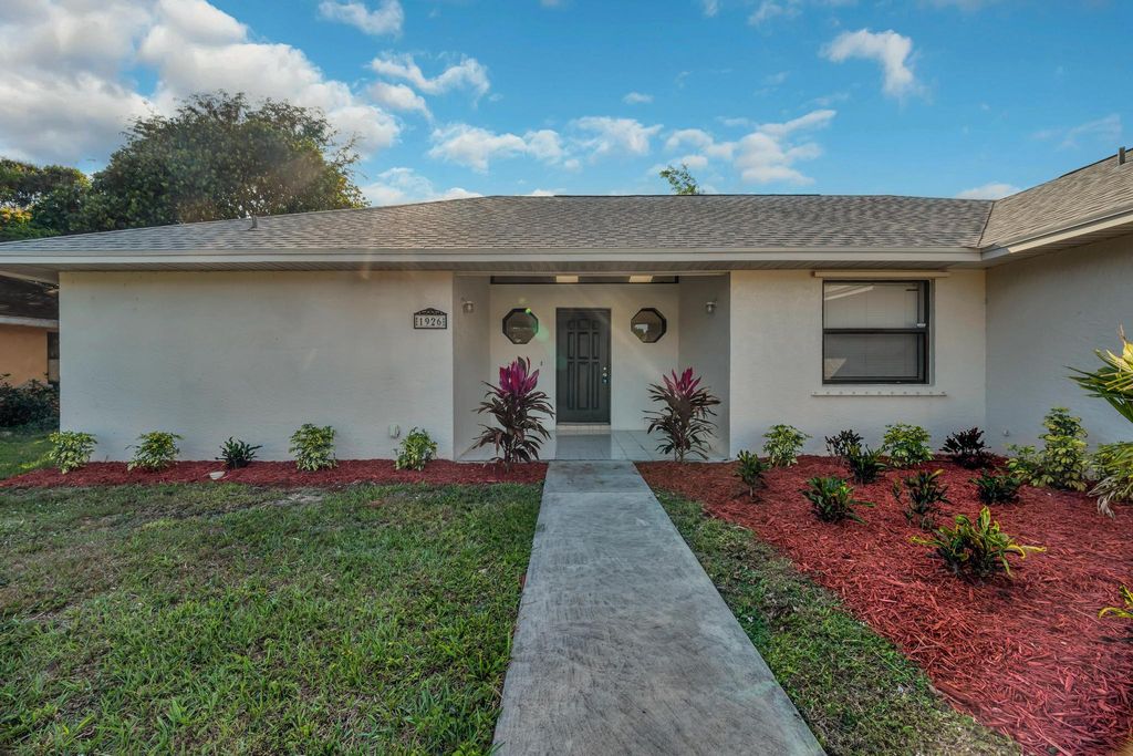 Photo of 1926 SE Floresta Drive, Port Saint Lucie, FL 34983 (MLS # R11083224)