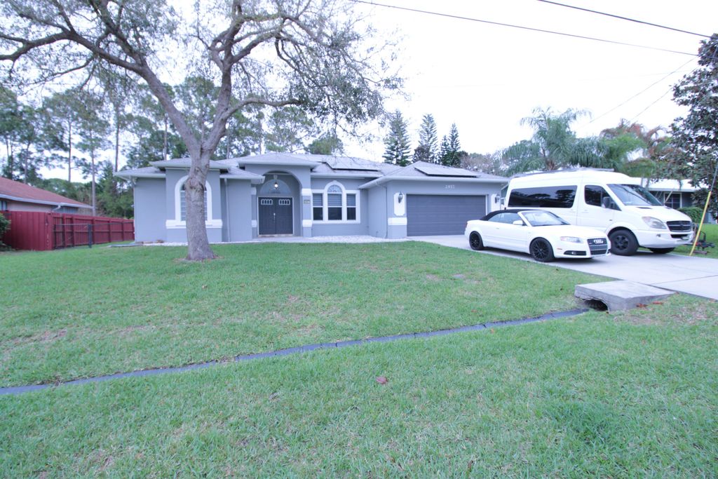 Photo of 2957 SW Collings Drive, Port Saint Lucie, FL 34953 (MLS # B26006834)