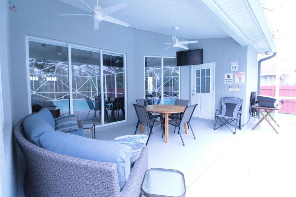 Photo of 2957 SW Collings Drive, Port Saint Lucie, FL 34953 (MLS # B26006834)