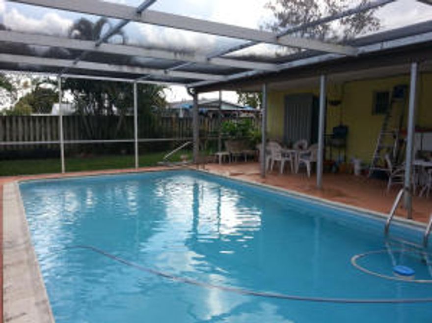 Great 4 bedroom, 2 bath pool home in fabulous Palm Springs Village location. This home features a covered screened patio, newer roof, new water heater, washer, dryer, dishwasher and plenty of closet space. Home has a fully functional security system, every door and window is protected. Sparkling pool recently resurfaced with new Diamond Bright. Terrazzo and tile floors throughout. This is a great starter home for a family. Sits on almost a 1/4 acre with a huge yard. NO HOA. Home is being sold AS IS.