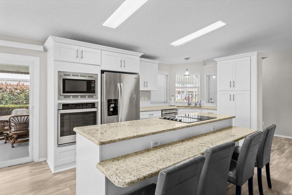 Photo of 8032 Meadowlark Lane, Port Saint Lucie, FL 34952 (MLS # R11165036)