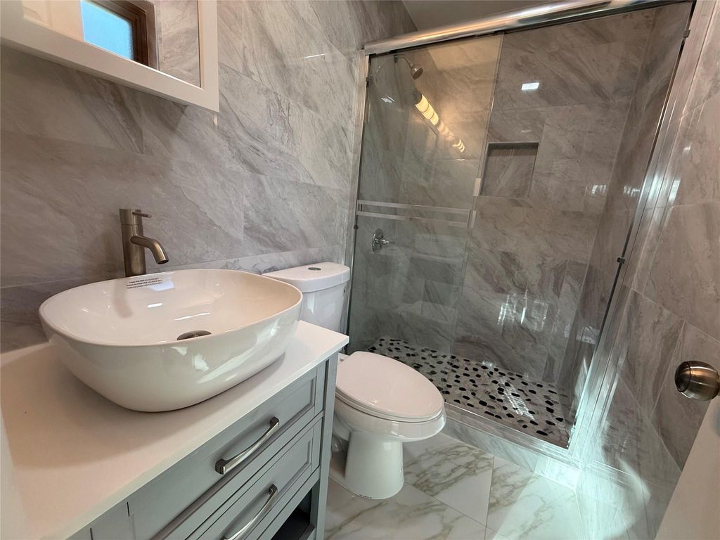 Photo of 4650 SW 25th Ter, Fort Lauderdale, FL 33312 (MLS # F10532098)
