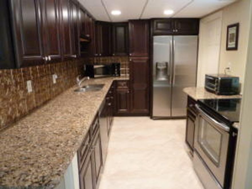 ***VIEW VIRTUAL TOUR***       You're sitting there on your computer looking for that perfect seasonal rental in Jupiter Ocean Racquet Club; and now you've found this gem. Just look at those pictures and virtual tour! And check out the remodeled kitchen with granite countertops and stainless steel appliances.  Tile floors throughout, nicely furnished, 3 flat screen TV's, king bed in master and trundle bed (converts into king or 2 sep twins)  in second bedroom.  Linens and kitchenware provided.  Easy access to Jupiter Beaches, Restaurants, Shopping, Theaters, Abacoa and Downtown at the Gardens.  Community amenities - 2 heated swimming pools, clubhouse, picnic area, manager on-site, nightly security patrol.  Tennis/Racquet Club on site for an additional fee.