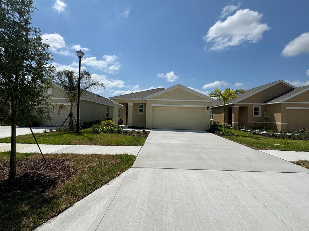 Photo of 12336 SW Nettuno Way, Port St Lucie, FL 34987 (MLS # R10973042)
