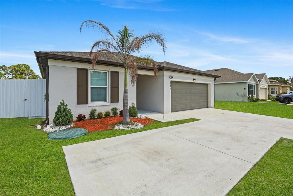 Photo of 1781 SW Del Rio Boulevard, Port Saint Lucie, FL 34953 (MLS # B26021389)