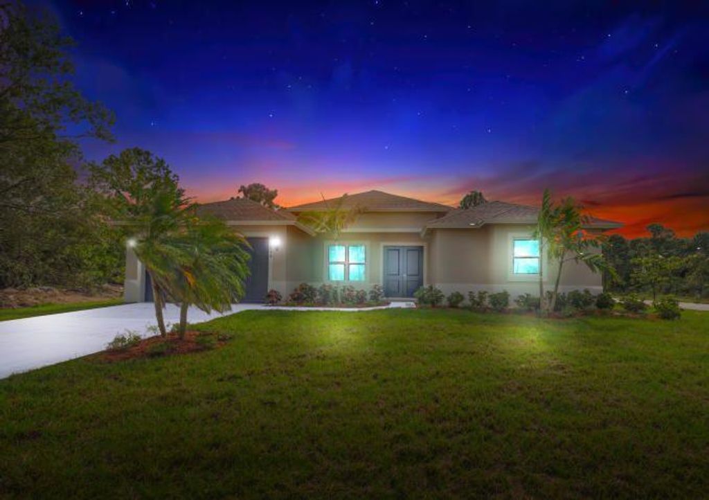 Photo of 1730 SW California Boulevard, Port Saint Lucie, FL 34953 (MLS # R10771241)