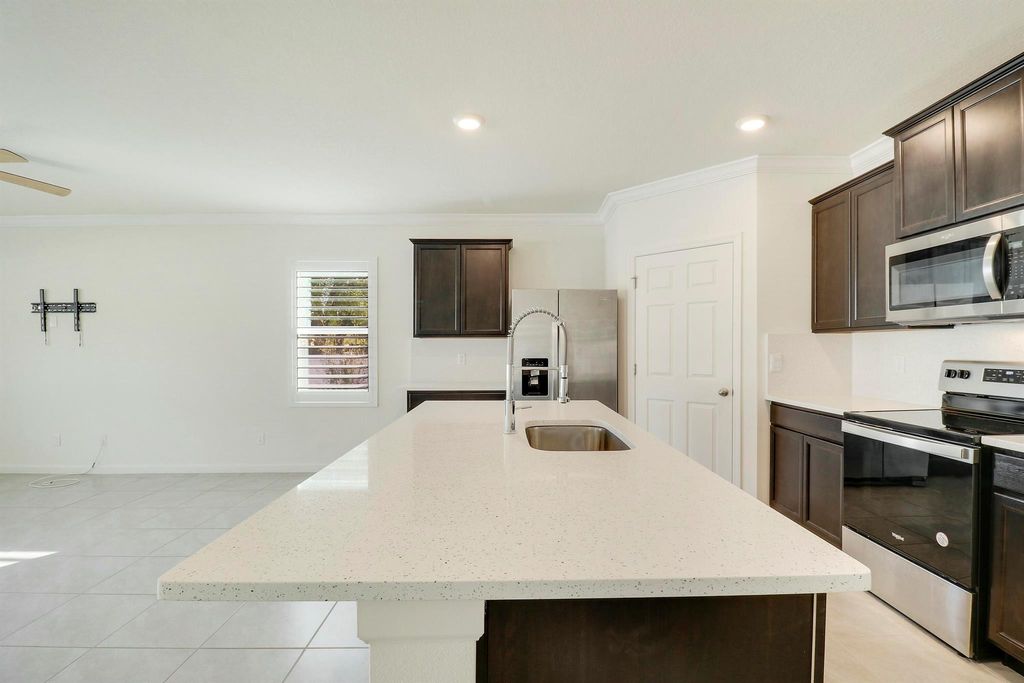 Photo of 1455 SW Bartell Avenue, Port Saint Lucie, FL 34953 (MLS # R11094265)