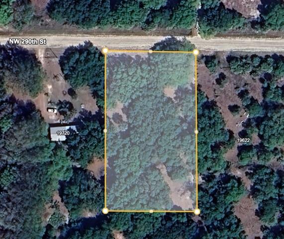Discover the perfect blend of natural beauty and serenity on this 1.25-acre lot, nestled among a canopy of mature oak trees. Tucked away from the hustle and bustle, this peaceful retreat offers the ideal setting for your dream home or weekend getaway. Enjoy the quiet surroundings! Power in front of property and close to the paved road. Endless possibilities that come with owning your own private slice of nature.