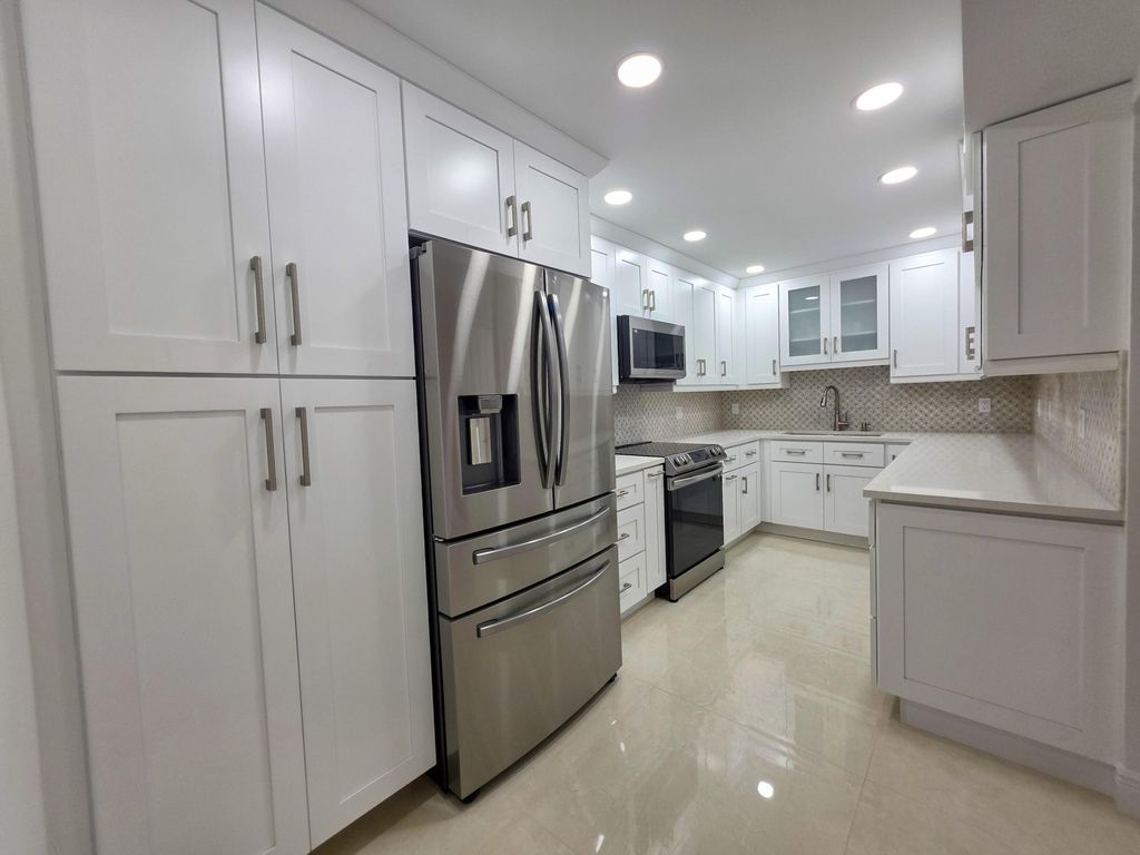 Photo of 3588 Alder Drive #D1, West Palm Beach, FL 33417 (MLS # B26017914)