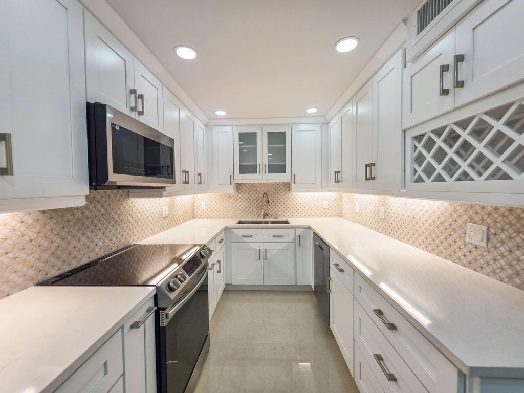 Photo of 3588 Alder Drive #D1, West Palm Beach, FL 33417 (MLS # B26017914)