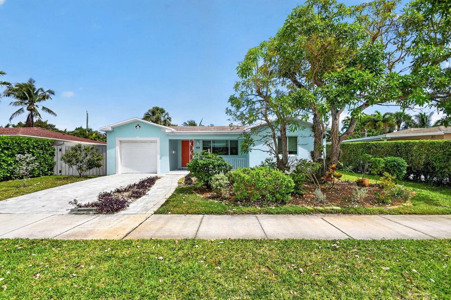 Brand new roof (2026), impact windows (2025), and fully renovated bathrooms (2025) headline this move-in ready home in the highly sought-after College Park neighborhood east of U.S. 1. NO HOA and NO pet restrictions—bring all your dogs! Tile flooring throughout with a versatile split-bedroom floor plan, ample closet space, and overhead garage storage. Fully fenced private backyard with two patios, including new paver patio (2025), perfect for relaxing or grilling. Lush tropical landscaping features avocado, coconut, plumeria, hibiscus, and more. Paver driveway and walkway (2024), new stainless refrigerator (2025), updated electrical panel and water heater (2016). Located in a non-flood zone just a short walk to the Intracoastal, with easy access to beaches, I-95, PBIA, and downtown and downtown Lake Worth Beach, West Palm Beach, and Palm Beach.