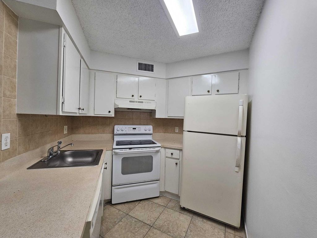 Photo of 214 Lake Pointe Drive #111, Oakland Park, FL 33309 (MLS # R11120325)