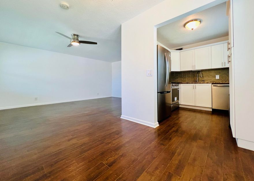 ELEGANT AND UPDATED WITH WATER VIEWS IN 55+ CENTURY VILLAGE! Gorgeous Move-in Ready CORNER 2/1.5. Pretty Updated Kitchen With BRAND NEW (Never Used) Full Stainless Appliance Package, White Shaker Style Cabinets, and Granite Counters. Updates to Baths. Long Screened Lanai Offers The Perfect Spot to Enjoy The Peaceful Water Views! Gleaming Luxury Wood Look Flooring Flows Throughout. Freshly Painted Interior. Upgraded New Ceiling Fans. Popcorn Removed From Ceilings. Impact Windows & Shutter For Slider Provide Storm Protection. Well Maintained Building With New Roof (11/2022). Century Village Is A Vibrant 55+ Community Centrally Located In Highly Desirable Palm Beach County, Florida! Enjoy An Active Lifestyle With Resort Style Amenities... Century Village is a 55+ Resort Style community with so much to offer - Much To Offer - shows, movies, clubs, pools, security, and transportation service. The Clubhouse features a theater, indoor pool, card room, community/party room, billiard room, shuffleboard, tennis, pickleball, bocce, and two outdoor pools, Numerous heated outdoor pools throughout the community. Separate fitness center with gym and outdoor heated pool & resistance pool. Two guarded gates and 24-hour roving security patrol.