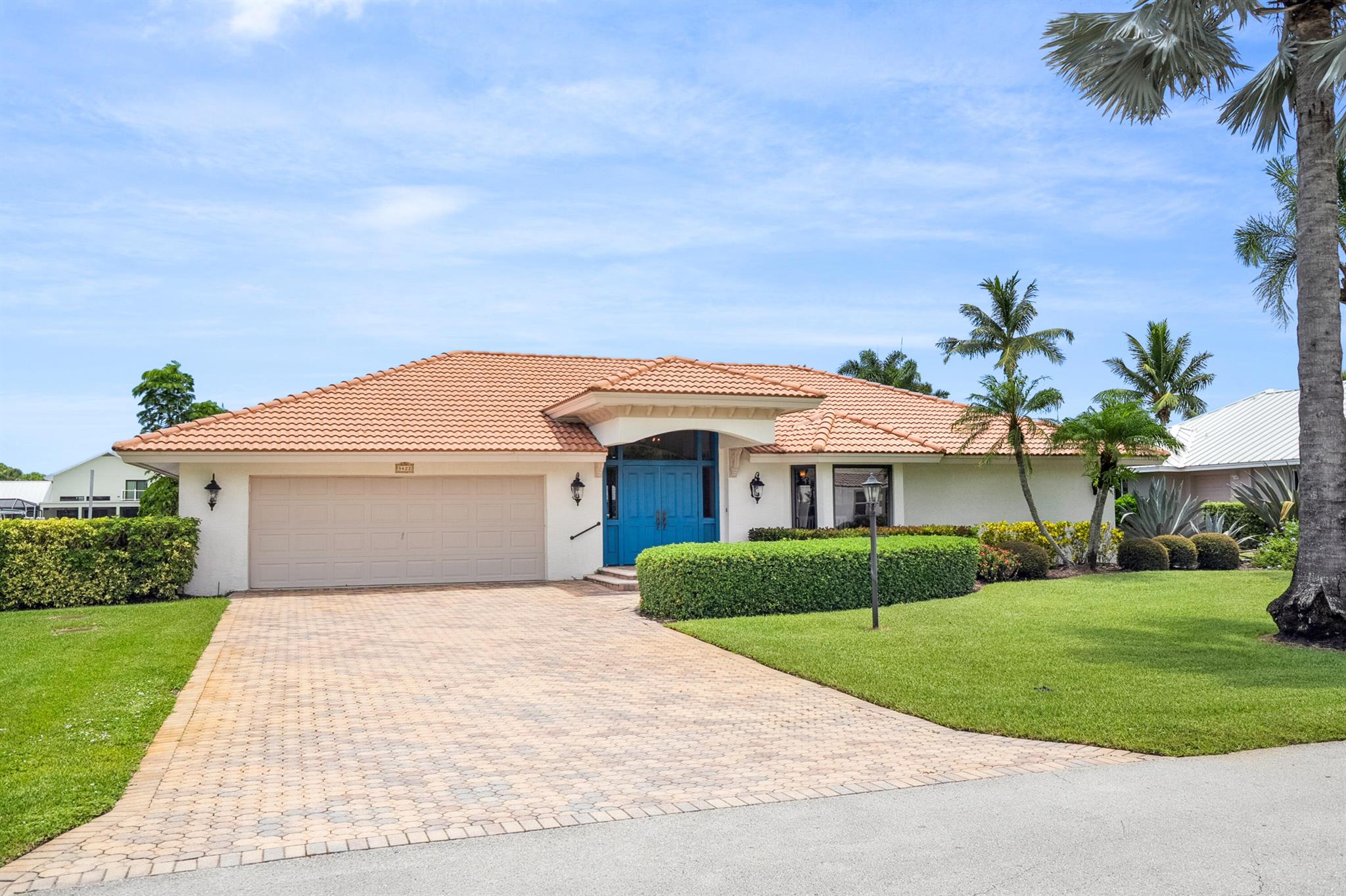 Welcome Home to your impeccably renovated 3-bdrm, 3-bath waterfront home with private dock located in the prestigious, guard-gated Stuart Yacht & Country Club. Perfectly positioned on a quiet cul-de-sac with direct canal access, this residence blends luxury living with effortless coastal charm. Designer chef's kitchen boasts custom cabinetry, Thermidor 6‑burner gas range & wall oven, wine fridge and newer S/S fridge, dishwasher & microwave. Airy and open living area perfect for entertaining or just relaxing, impact glass window's/sliders throughout, owner's suite w/ spa bath; 2 en‑suite guest rooms. Step through the sliders to your newly screened lanai and stunning pool! 30,000 lb boat lift with newer Seawell cap and tiebacks (2019). Enjoy this low HOA gated community with golf