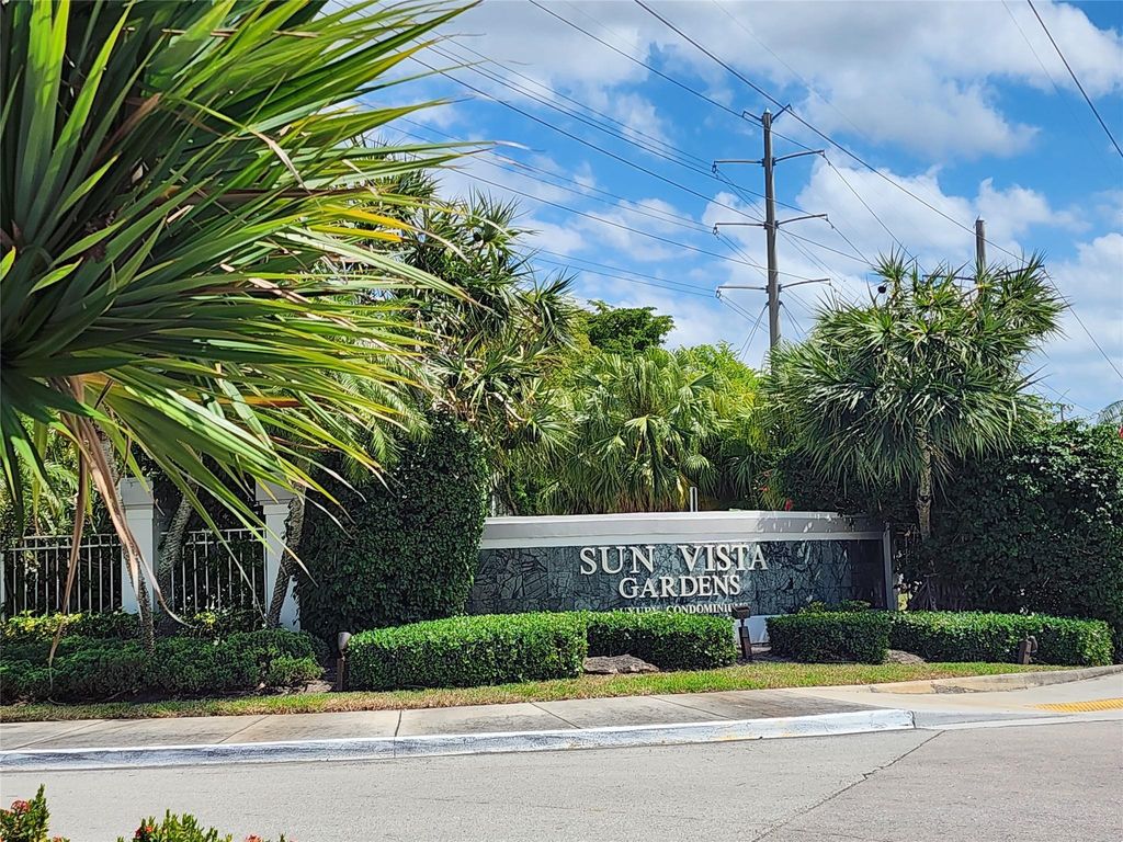Photo of 5686 NW Rock Island Road #102, Tamarac, FL 33319 (MLS # F10534317)