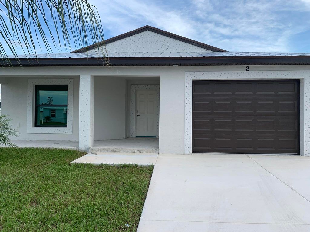 Photo of 52 Mediterranean Blvd N Boulevard N, Port Saint Lucie, FL 34952 (MLS # R11124126)