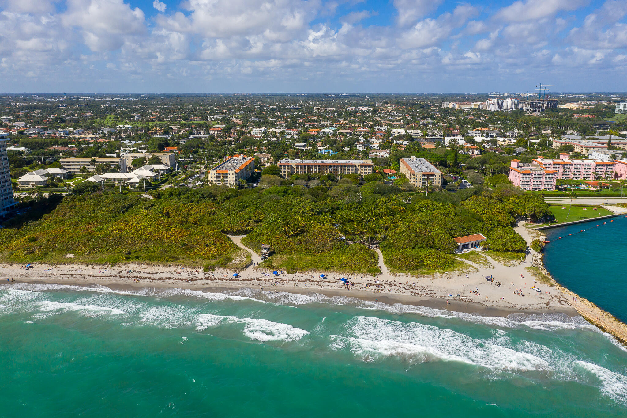 Welcome to Tierra Del Mar where exceptional value meets an unbeatable East Boca Raton address. Just steps from the Atlantic Ocean, this rare offering places you across the street from the beach and minutes from the city's best dining, shopping, and entertainment.Inside, 1,093 square feet of light filled living space feature two spacious bedrooms, two updated bathrooms, and a gourmet kitchen with stainless steel appliances and generous counter space. A formal dining room adds sophistication, while the serene primary suite offers ample closet space and a private ensuite.Enjoy resort style amenities including a heated pool, tennis and pickleball court, clubhouse, saunas, and barbecue areas, all in a secure building with assigned parking.