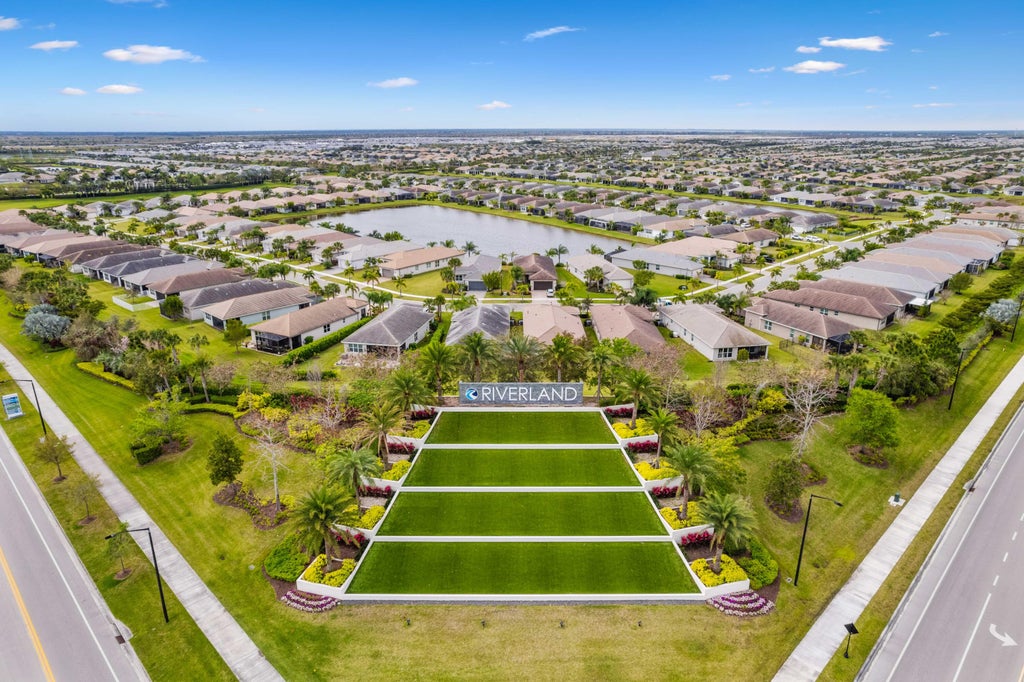 Photo of 11941 SW Marigold Lakes Drive, Port Saint Lucie, FL 34987 (MLS # R10965370)