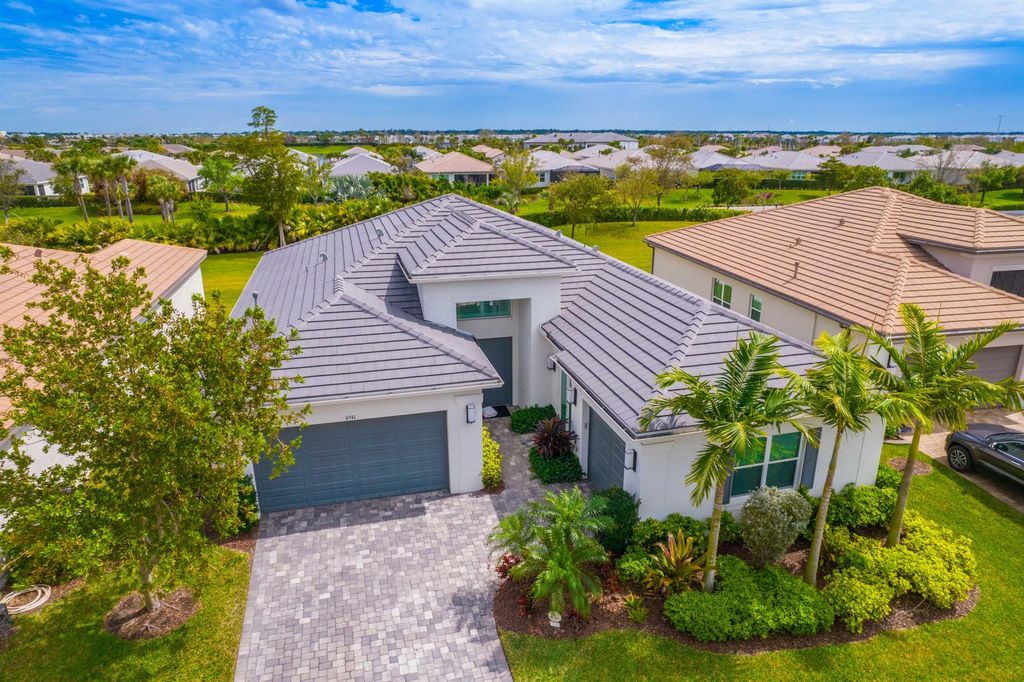 Photo of 11941 SW Marigold Lakes Drive, Port Saint Lucie, FL 34987 (MLS # R10965370)