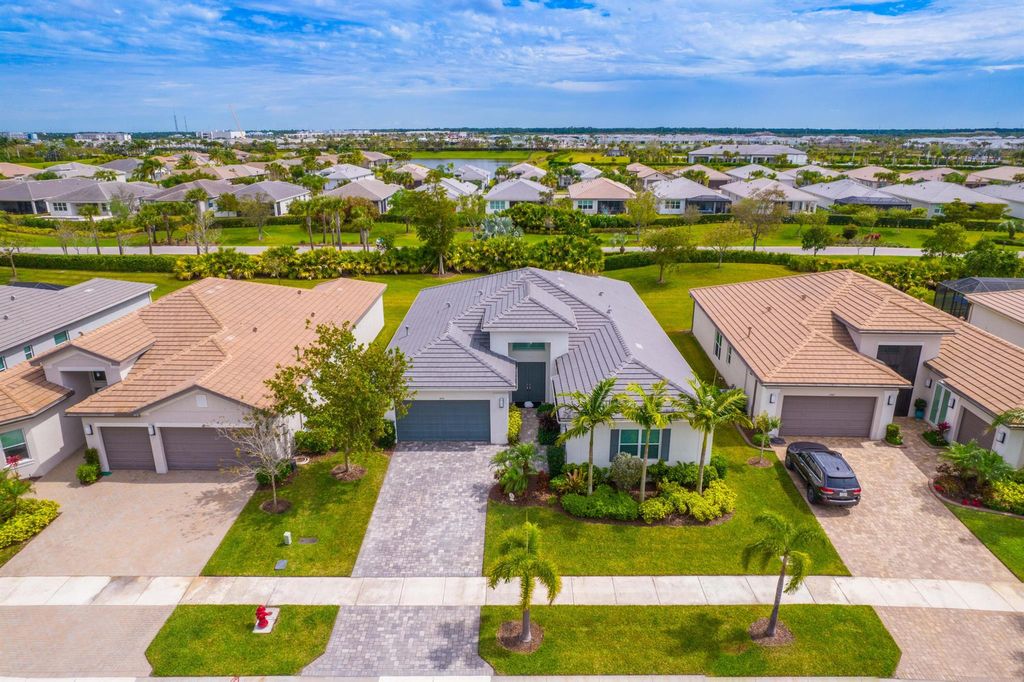 Photo of 11941 SW Marigold Lakes Drive, Port Saint Lucie, FL 34987 (MLS # R10965370)