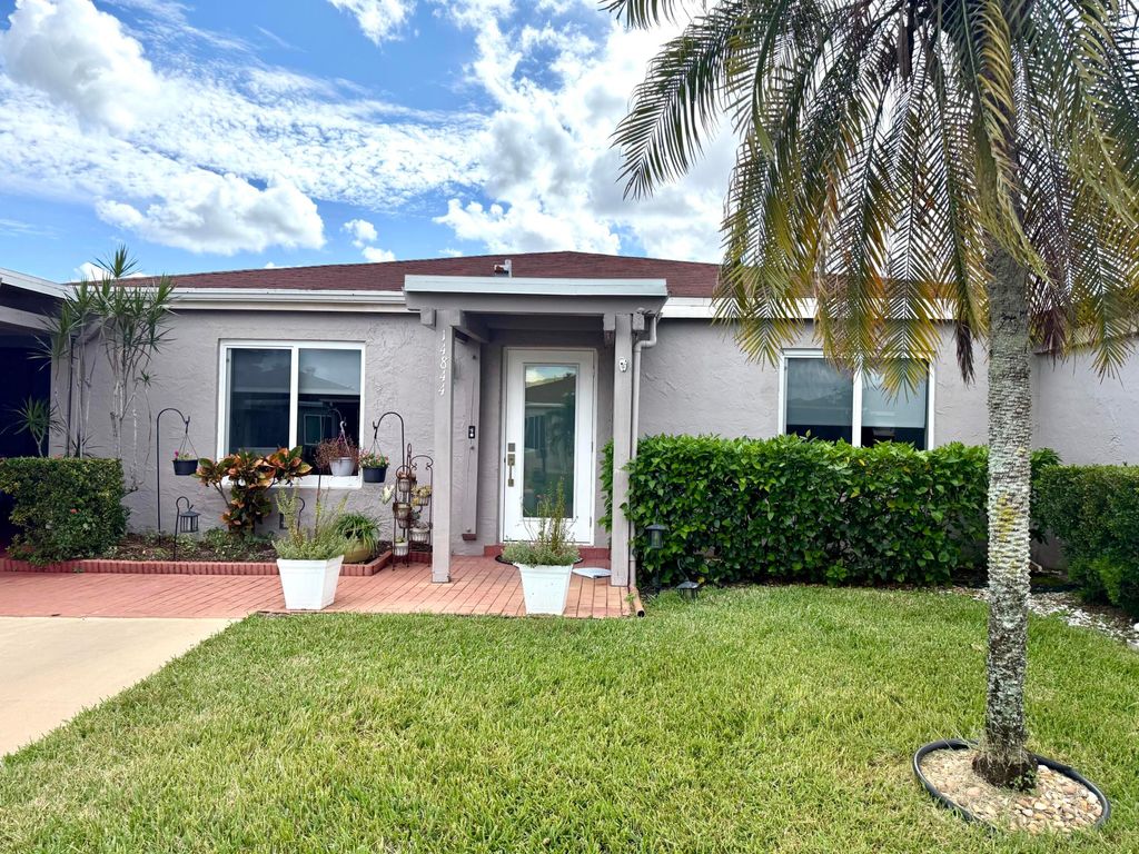 Photo of 14844 Wildflower Lane, Delray Beach, FL 33446 (MLS # R11129872)