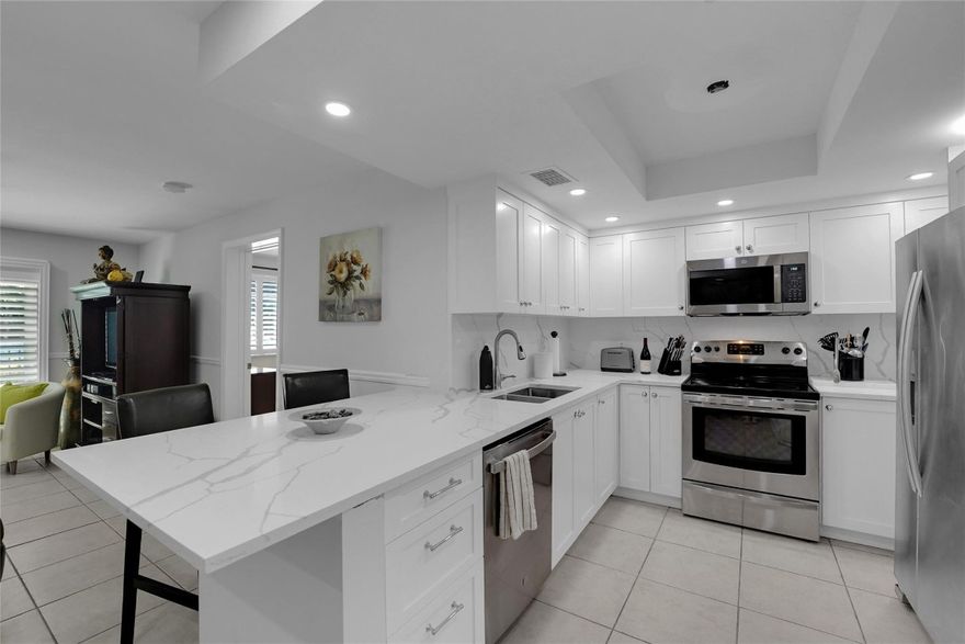Now available for an annual lease **Furnished** Located East of Federal Hwy in a gated community with 24/7 security, & only 5 minutes from Ft. Lauderdale beach & airport. Pet friendly, allows motorcycles, & golf carts! Open & split floorplan with a brand new kitchen & full size washer / dryer in the garage. Both rooms are close in size with queenbeds. The community boasts top notch amenities including large swimming pool, new club house, computerroom, grille area, & 24 hr gym with top of the line exercise equipment. No need to travel far, you are located inthe heart of Ft. Lauderdale! Publix, LA Fitness, shopping & more are all walking distance. Owners will keep their car parked in the garage.