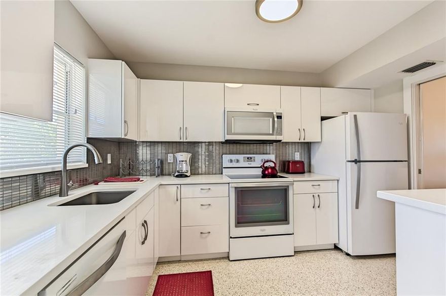 LOTS OF NATURAL LIGHT IN THIS PROFESSIONALLY DESIGNED UNIT AT THE GARDENS! OUTSTANDING 2 BEDROOM/2 BATHROOM UNIT WITH DRAMATIC UPGRADES. NEW COUNTERTOPS, CABINETRY, AND APPLIANCES IN THE KITCHEN. EYE CATCHING LIGHTING AND FANS THROUGHOUT. LARGE BEDROOMS W/ PLENTY OF STORAGE, INCLUDING AN OVERSIZED WALK-IN MASTER CLOSET. THE BATHROOMS ARE EQUIPT WITH FLOATING WHITE VANITIES AND SEAMLESS SHOWER DOOR IN MASTER. ENJOY THE SOUTH FLORIDA WEATHER BY THE BEAUTIFUL POOL OR ON YOUR PRIVATE BALCONY.