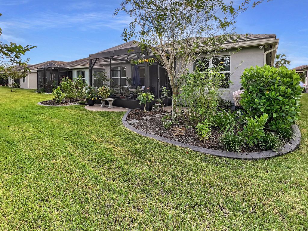 Photo of 11099 SW Carriage Hill Lane, Port Saint Lucie, FL 34987 (MLS # R10925365)