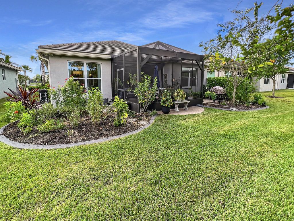 Photo of 11099 SW Carriage Hill Lane, Port Saint Lucie, FL 34987 (MLS # R10925365)