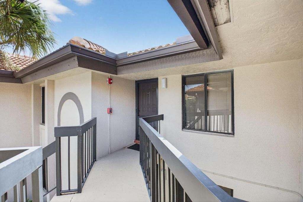 Photo of 5151 W Club Circle #205, Boca Raton, FL 33487 (MLS # R11089392)