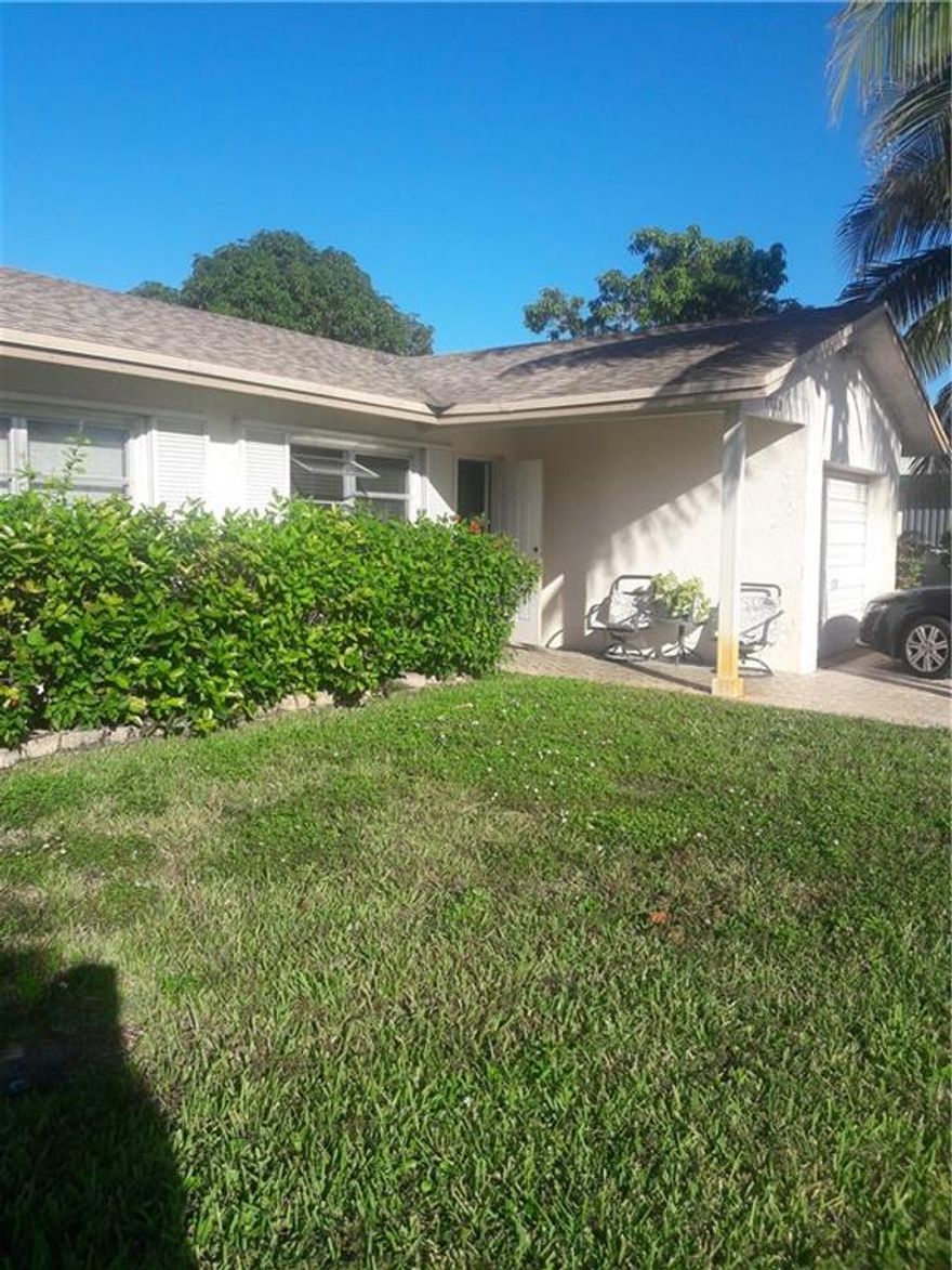 BEAUTIFUL HOME NESTLED IN THE BEAUTIFUL CITY OF TAMARAC! WELL MAINTAINED COMMUNITY, ALL AGES WELCOME!! 2 BEDROOM/2 BATHROOM 1 CAR GARAGE HOME WITH A BONUS ROOM! SEPERATE LIVING ROOM AND DINING AREA!. BEING SOLD AS-IS. VERY SPACIOUS HOUSE. PLEASE SEE BROKER REMARKS REGARDING SHOWING INSTRUCTIONS!