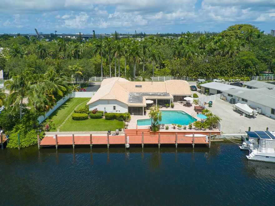 BOATERS PARADISE FOUND!Luxury residence located in a truly tropical setting along Fort Lauderdale's New River. Mega yacht owners will appreciate a deep water safe haven that includes 100' of dockage and unimpeded access to Intracoastal Waterway and Port Everglades. Home features a split floor plan with Captains Quarters that extenuate this 5 bdr, 3.5 bath, 2-car garage on oversized lot with No Thru Traffic. Just a short distance from Davie Blvd, I-95, Ft. Lauderdale Int. Airport, and Ft. Lauderdale's cultural hotspot, Las Olas. Amenities include oversized swimming pool, jacuzzi, outdoor kitchen and more. Enjoy a relaxing evening with your family and friends while viewing spectacular sunsets to the west after a day or work or play.