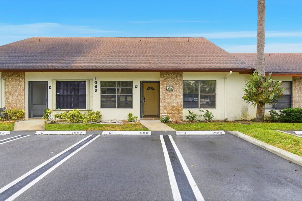 Photo of 1060 Parkside Green Drive #D, Greenacres, FL 33415 (MLS # R11161846)