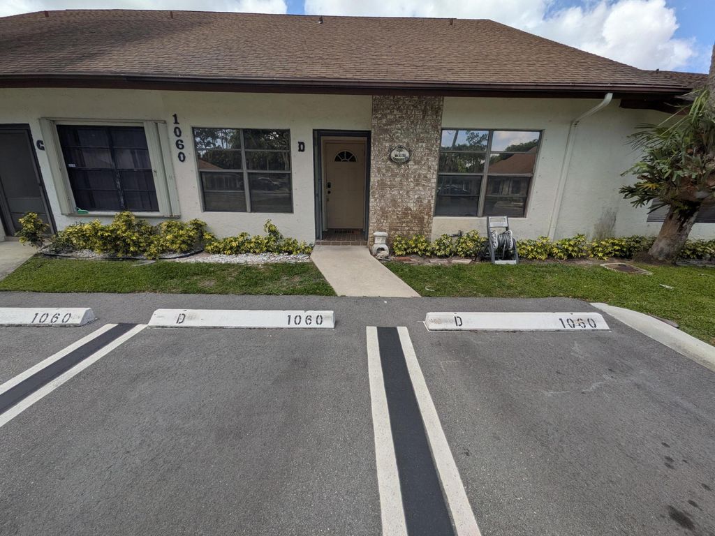 Photo of 1060 Parkside Green Drive #D, Greenacres, FL 33415 (MLS # R11161846)
