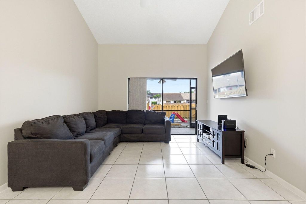 Photo of 1060 Parkside Green Drive #D, Greenacres, FL 33415 (MLS # R11161846)