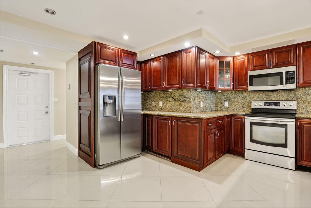 Photo of 3499 Oaks Way #909, Pompano Beach, FL 33069 (MLS # B26001324)