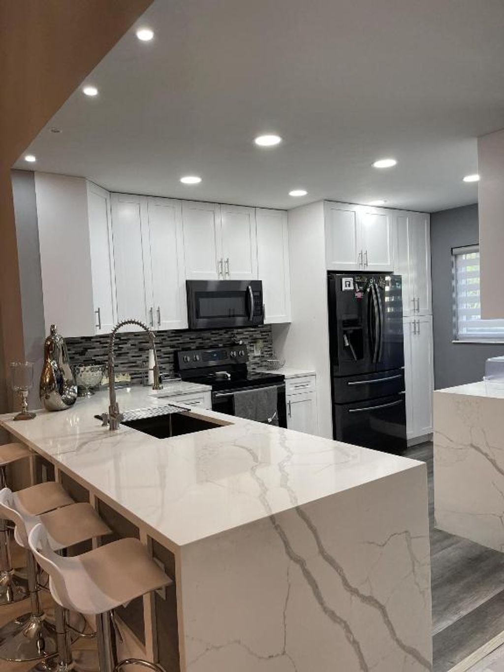 Photo of 1816 Tamarind Lane, Coconut Creek, FL 33063 (MLS # R10978324)