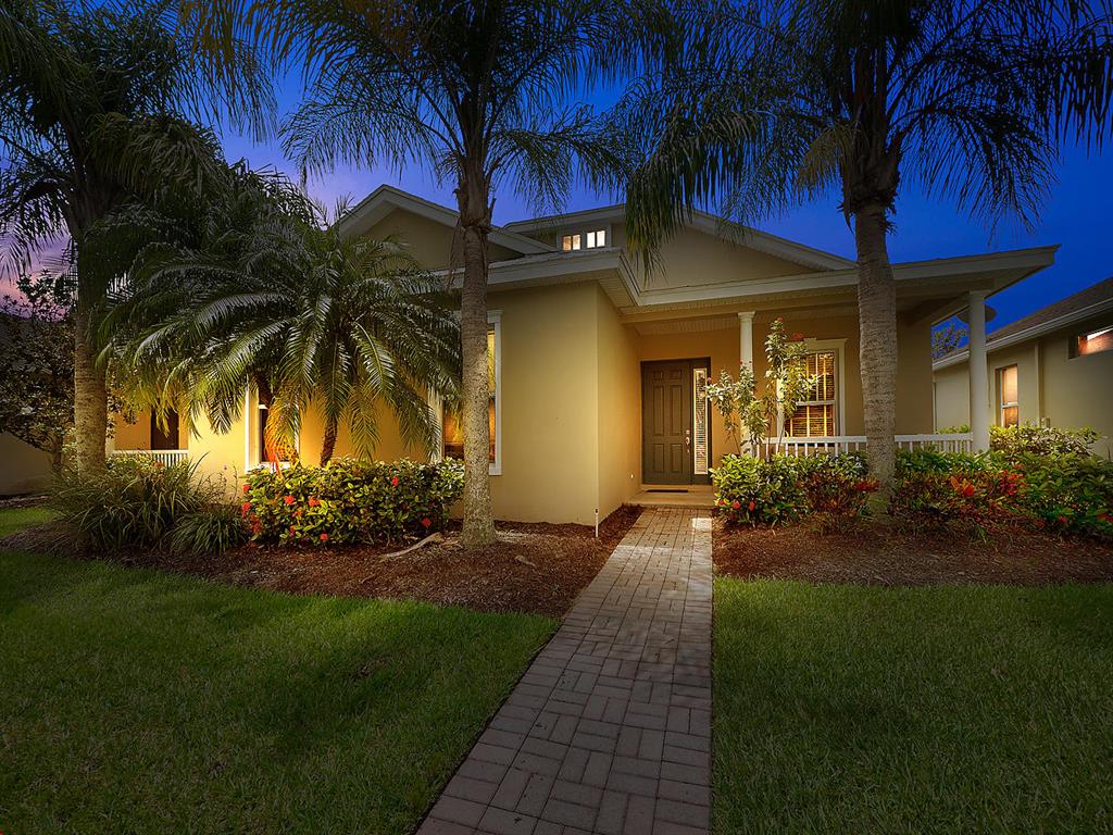Upgraded 3 bedroom and 2 bath home with a detached 2 car garage in the heart of Tradition! Beautiful finishes and features inside and out including a spacious covered porch, foyer, ceramic tile flooring, and engineered hardwood in the bedrooms. The updated kitchen features stainless appliances, quartz countertops, custom backsplash, white cabinets, and a farm style sink. The large fenced in backyard boasts plenty of room for large gatherings of friends and family! Bedford Park is a peaceful and quiet community that has a small town feel and features a community pool, clubhouse, and is conveniently located close to Tradition Square. Tradition is a planned community and features sprawling lakes, green spaces, dining and shopping, and easy access to I-95 and close to Tradition Medical Center.