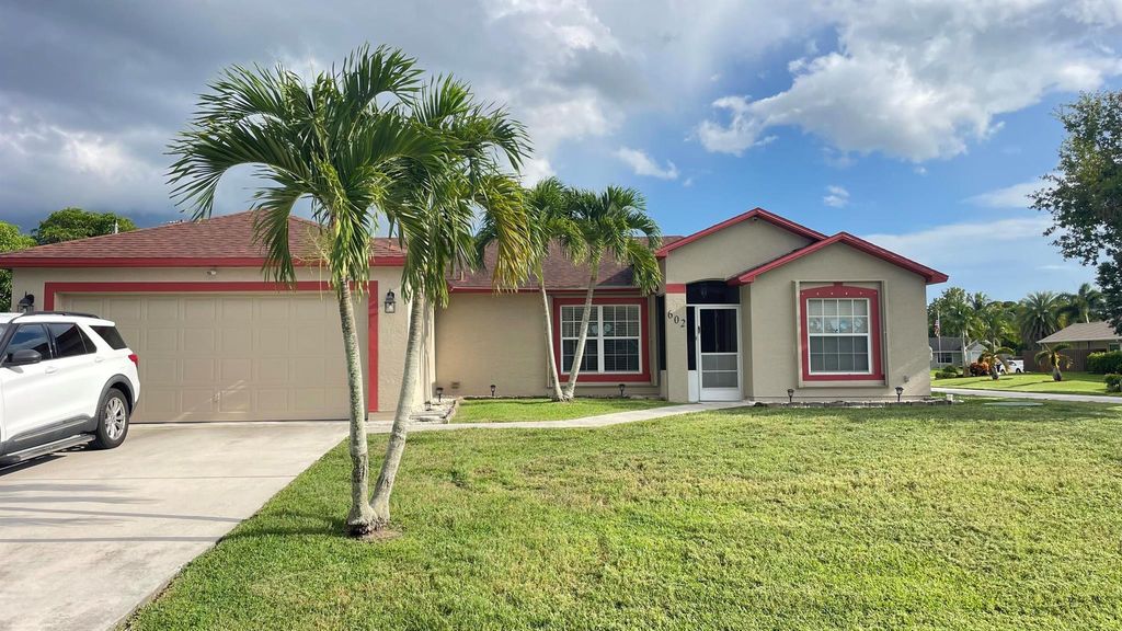Photo of 602 SE Streamlet Avenue, Port St Lucie, FL 34983 (MLS # R11007959)