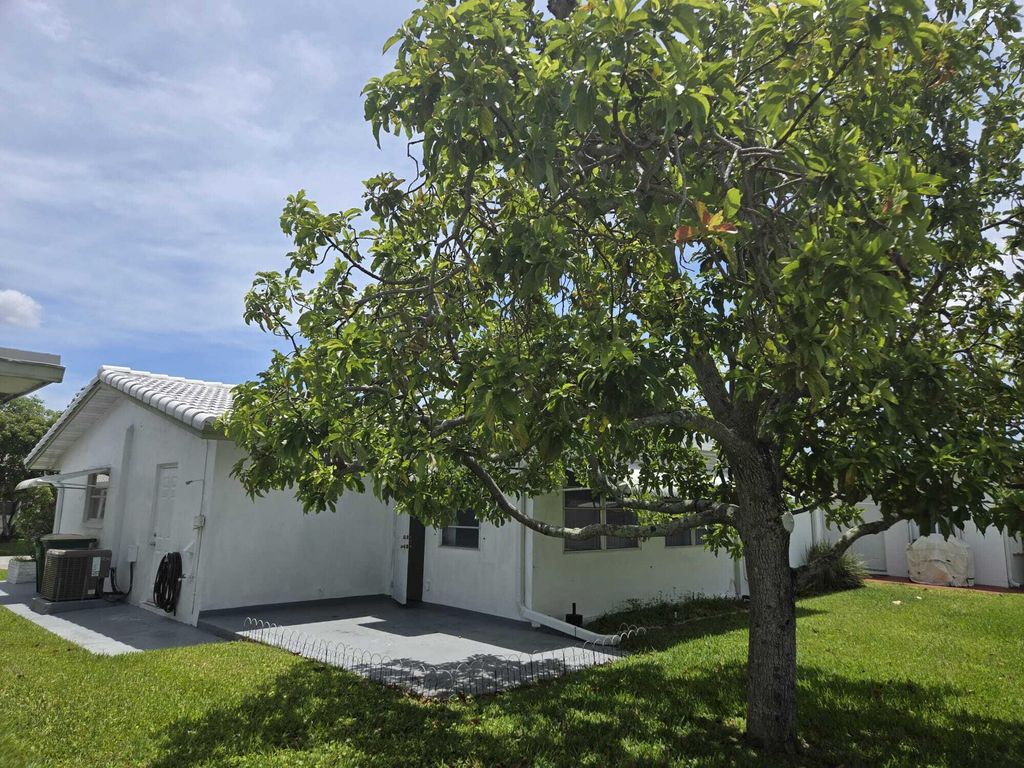 Photo of 5805 NW 83rd Avenue, Tamarac, FL 33321 (MLS # B26025160)