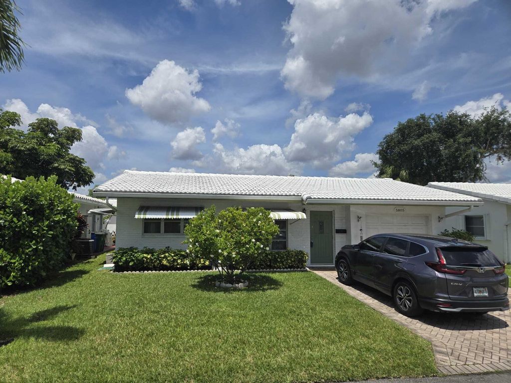 Photo of 5805 NW 83rd Avenue, Tamarac, FL 33321 (MLS # B26025160)