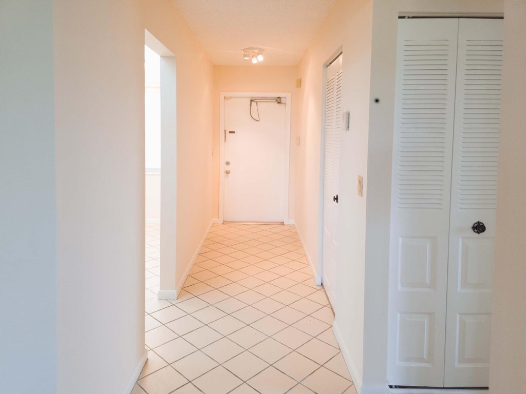 Photo of 24 Abbey Lane #301, Delray Beach, FL 33446 (MLS # B26069414)