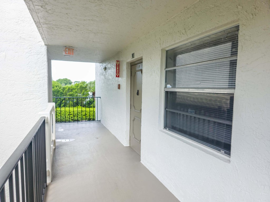 Photo of 24 Abbey Lane #301, Delray Beach, FL 33446 (MLS # B26069414)