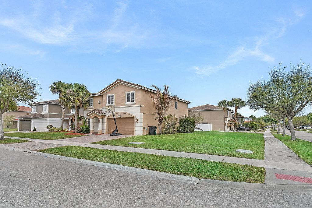 Photo of 2883 SW Cape Breton Drive, Port Saint Lucie, FL 34953 (MLS # B26014064)